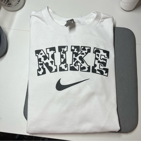 Tops - Cow Print Swoosh NEW white short sleeve shirt
